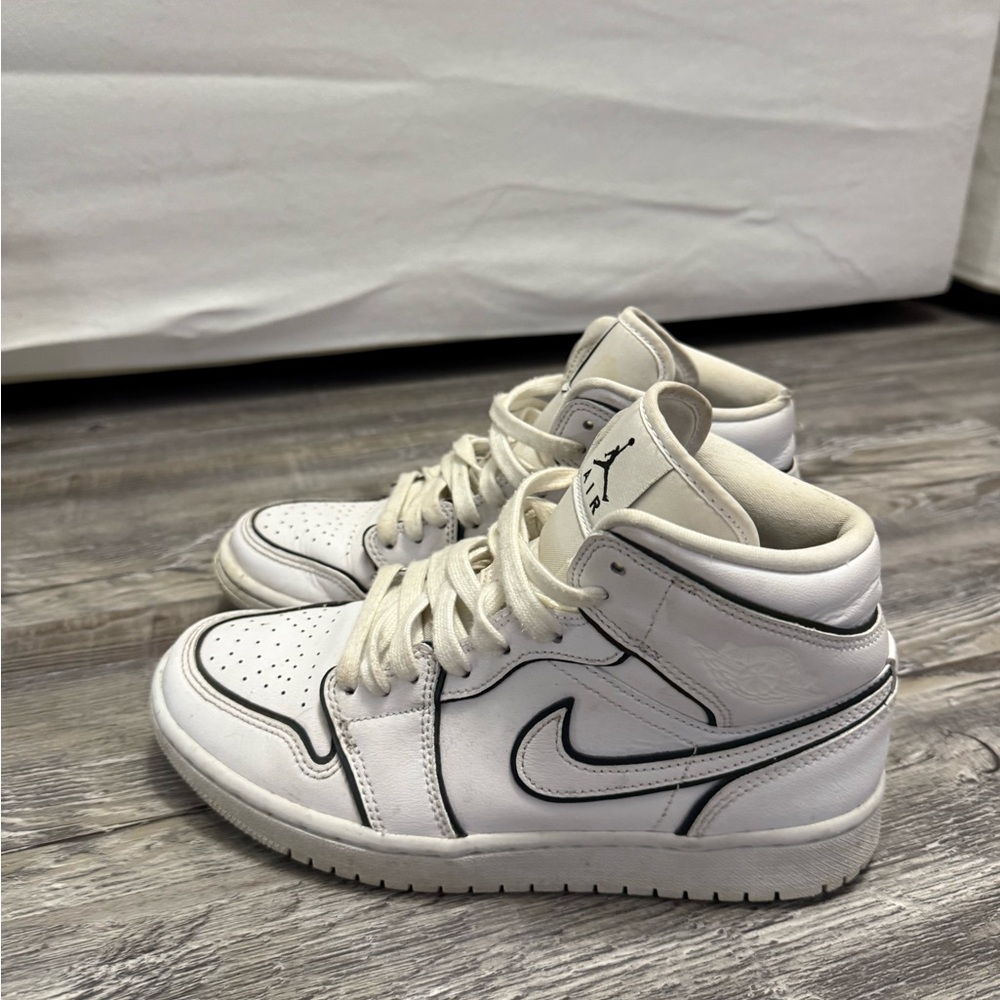 Jordan Women’s White and Black High-Top Sneakers